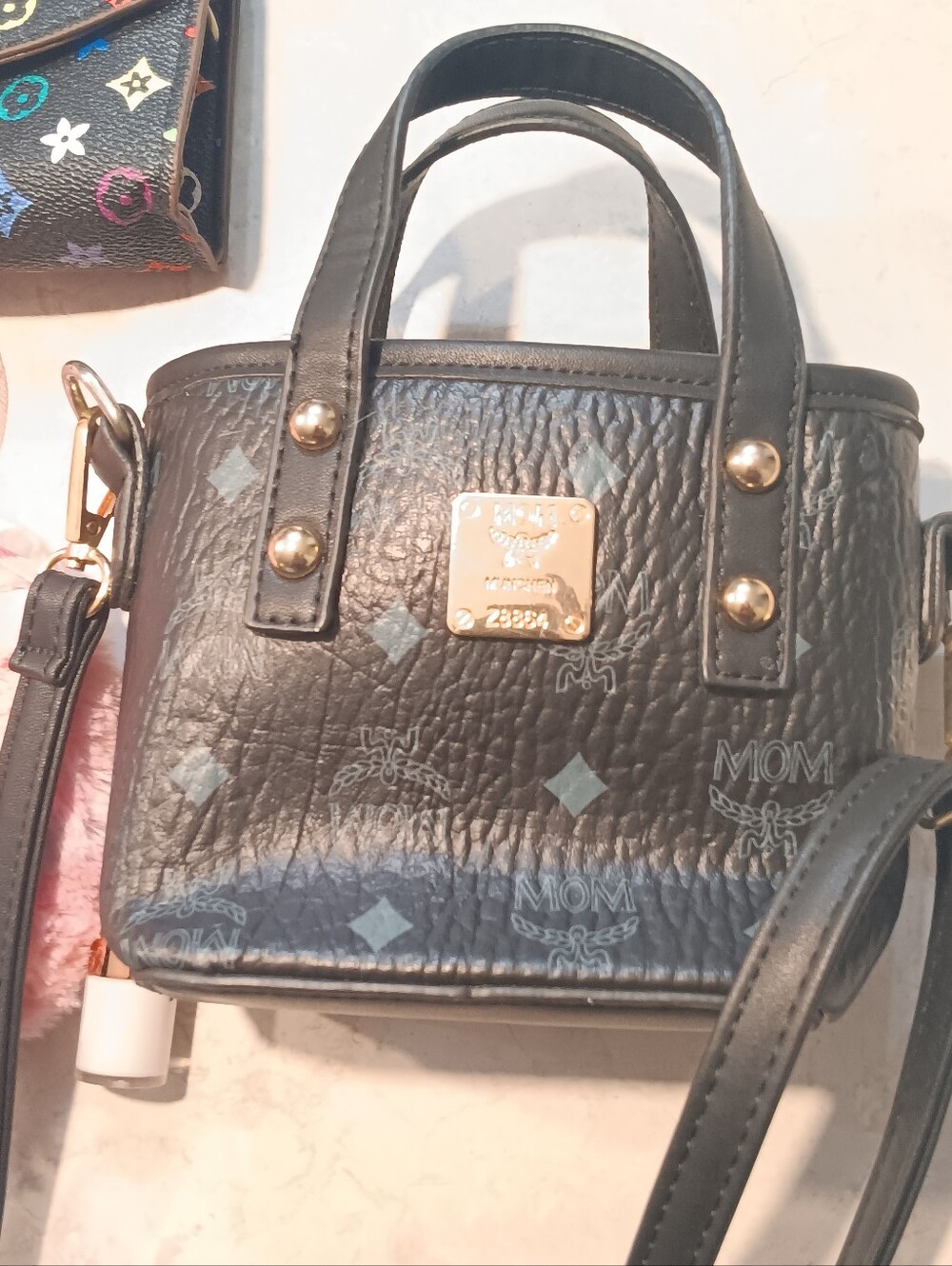 SOLD.   Black MOM Embossed Mini Tote with Gold Hardware